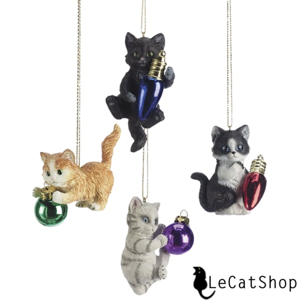 Cats playing chistmas ornaments